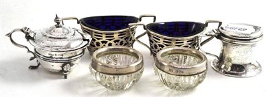 Lot 399 - Two pierced silver salts with blue glass liners, two salts and two mustards