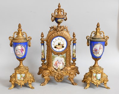 Lot 217 - A French Gilt metal Porcelain Mounted Striking...