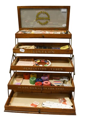 Lot 1308 - A 1920s Oak Concertina Haberdashery "Listers's...