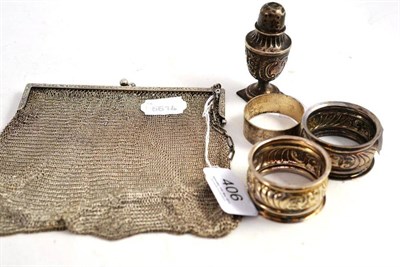 Lot 406 - White metal evening bag/reticule stamped 'Sterling', three napkin rings and a silver pepperette