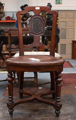 Lot 1418 - A Victorian Craved Chair, the splat carved...