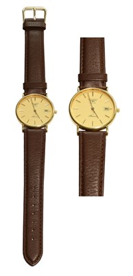 Lot 411 - A 9 Carat Gold Calendar Centre Seconds Quartz...