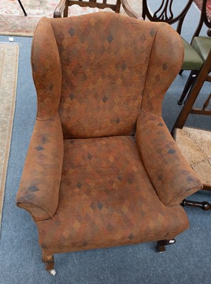 Lot 1399 - A 19th Century Wingback Chair, with walnut...