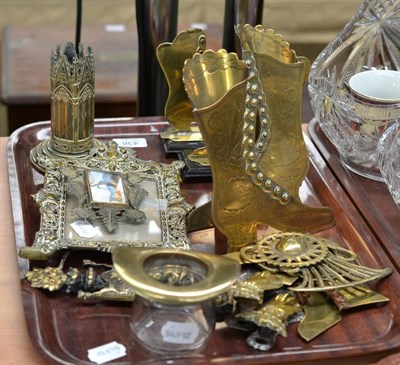 Lot 438 - Two pairs of Victorian brass boot ornaments, brass and glass top hat posy holder and a cast...