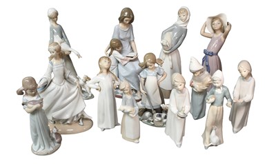 Lot 117 - Lladro Porcelain Figures, including girl with...