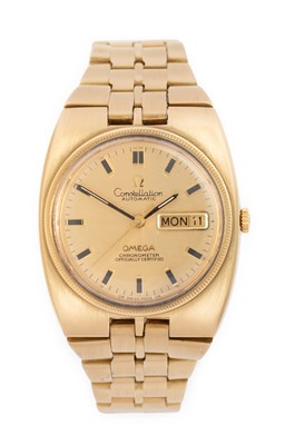 Lot 2430 - Omega: An 18 Carat Gold Automatic Day/Date...