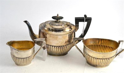 Lot 458 - Walker and Hall silver three piece tea set