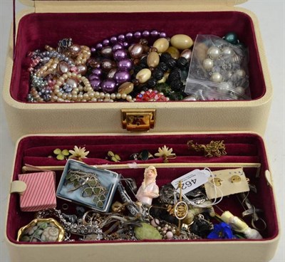 Lot 462 - A box of jewellery including a seed pearl set and white enamelled bar brooch, earrings, beads,...