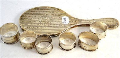 Lot 465 - A silver backed hand mirror and six various silver napkin rings