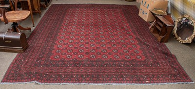 Lot 1287 - Afghan Carpet, the raspberry field with...