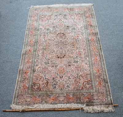 Lot 1309 - Chinese Silk Rug, ivory field with scrolling...