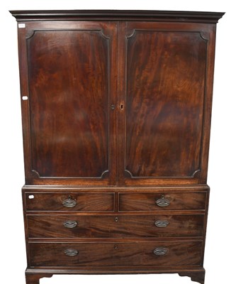 Lot 1342 - A George III Mahogany Press Cupboard, the...