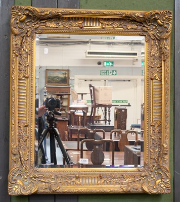 Lot 1356 - A Reproduction Gilt Framed Mirror, the...