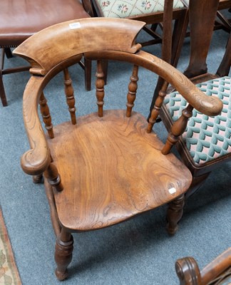 Lot 1403 - A 19th Century Elm Captain's Chair