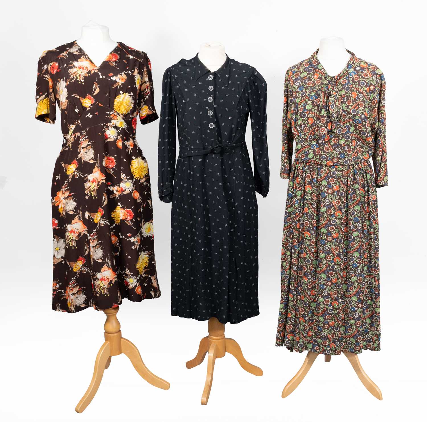 Lot 2064 - Circa 1940s Day Dresses comprising a brown...