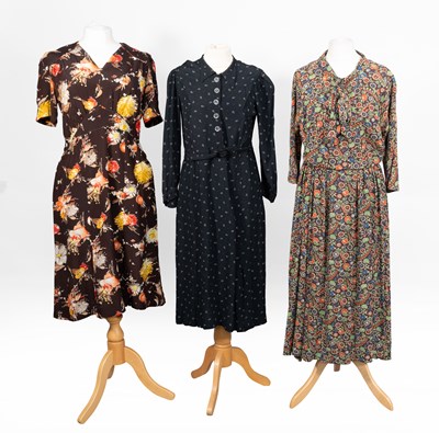 Lot 2064 - Circa 1940s Day Dresses comprising a brown...