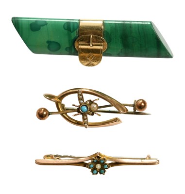 Lot 453 - A Malachite Brooch, the asymmetric malachite...