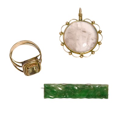 Lot 430 - A Jade Brooch, the peirced and carved jade...