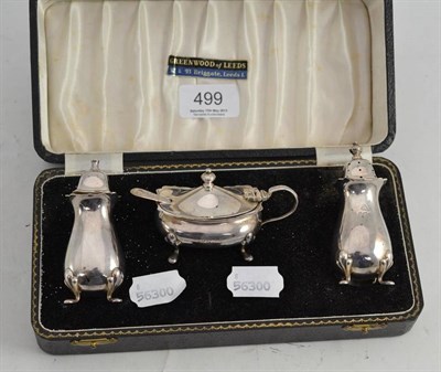 Lot 499 - A silver three piece cruet, boxed