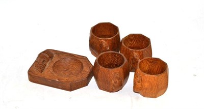 Lot 509 - Four Mouseman napkin rings and an ash tray