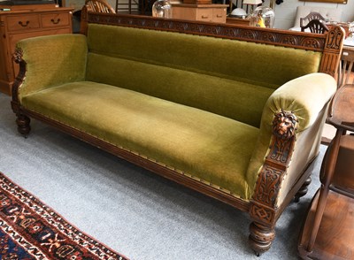 Lot 1518 - A Victorian Sofa, green upholstered and with...