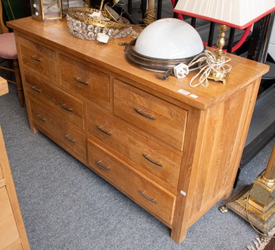 Lot 1545 - A Modern Oak Sideboard, fitted with an...