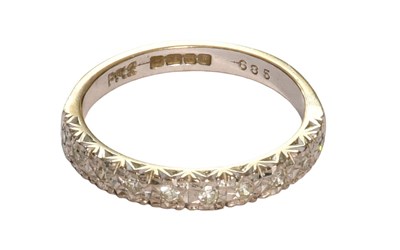 Lot 493 - An 18 Carat White Gold Diamond Half Hoop Ring,...