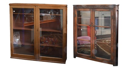 Lot 1370 - A Reproduction Carved Oak Free-Standing...