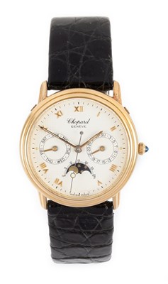 Lot 2400 - Chopard: An 18 Carat Gold Day/Date Centre...