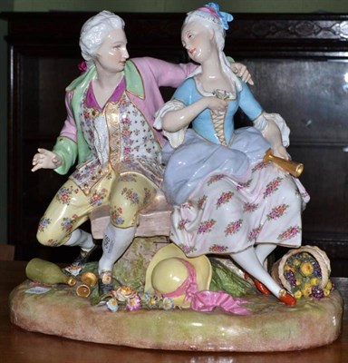 Lot 546 - Continental figural group of a gent and a maiden seated on a bench