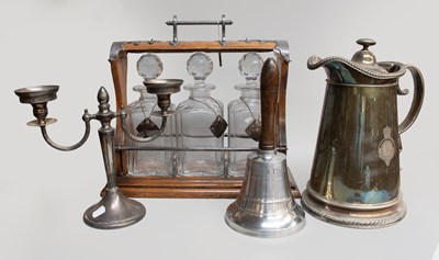 Lot 384 - An Oak and Silver-Plate Tantalus, with three...