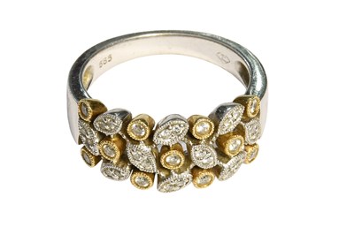 Lot 471 - A Bi-Coloured Diamond Ring, of foliate design,...