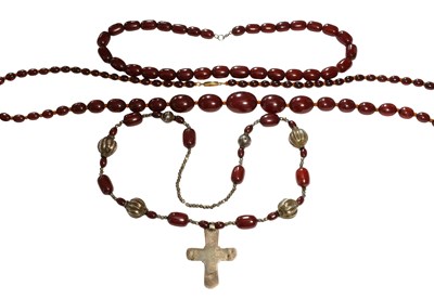 Lot 512 - Three Bakelite/Cherry Bead Necklaces, of...