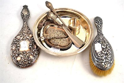 Lot 574 - A silver circular dish, silver backed brushes, hand mirror, etc