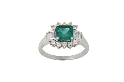 Lot 2255 - An Emerald and Diamond Cluster Ring the...