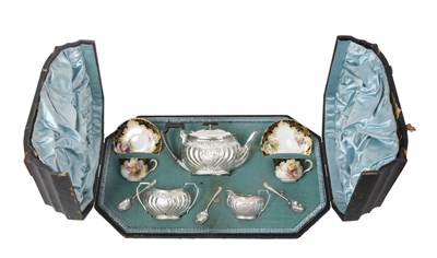 Lot 2129 - A Cased Victorian and George V Silver Tea-Service