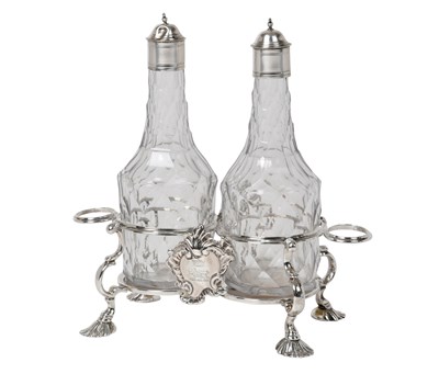 Lot 2001 - A George II Silver Cruet-Stand With Two Silver-Mounted Cut-Glass Bottles