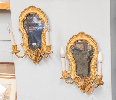 Lot 1474 - A Pair of Carved Giltwood Wall Lamps