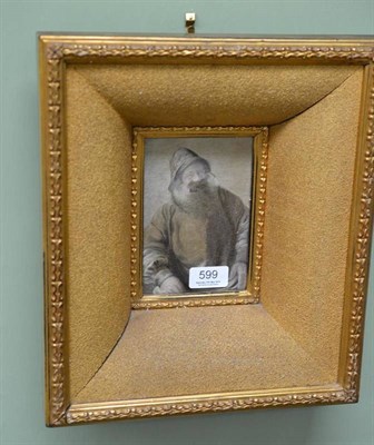 Lot 599 - A framed silk picture of a fisherman