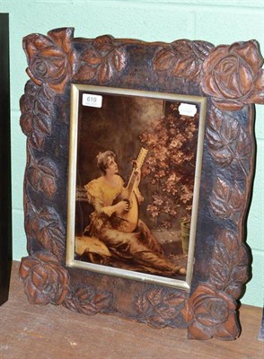 Lot 619 - Crystoleum of a pretty young girl playing a lute, contained in a wooden frame