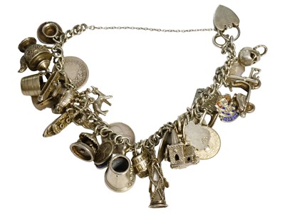 Lot 500 - A White Curb Link Bracelet, suspending...