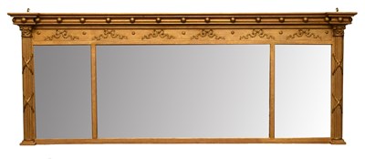 Lot 1355 - A Regency-Style Sectional Mirror, the inverted...