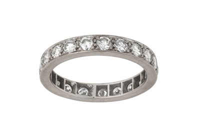 Lot 2230 - A Diamond Eternity Ring the twenty-one round...
