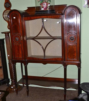 Lot 641 - A late 19th century mahogany display cabinet with glazed central section flanked by two panel...