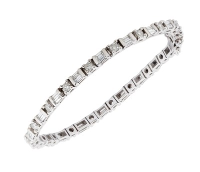 Lot 2308 - A 9 Carat White Gold Diamond Bracelet pairs of...