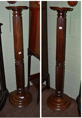 Lot 643 - Pair of mahogany torcheres