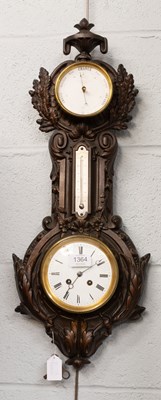 Lot 1364 - A Cast Metal Striking Wall Clock with combined...