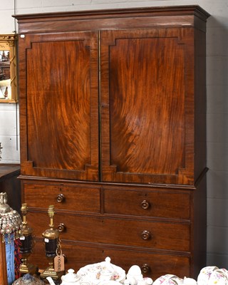 Lot 1352 - A George III Mahogany Linen Press, the moulded...