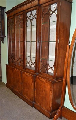 Lot 659 - Reproduction mahogany and yew break front display cabinet