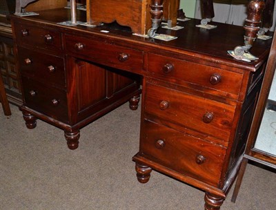 Lot 669 - Mahogany twin pedestal desk